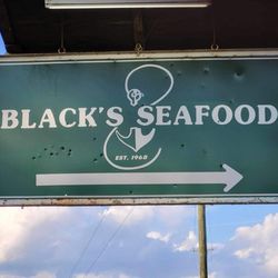 Black's Seafood - Signage on "main" road directing toward restaurant