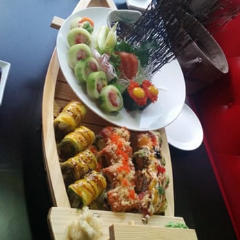 Izu Sushi - Had no idea how much food we ordered until it arrived in a boat! - Japanese Near Me - Denver, Colorado Izu Sushi - Had no idea how much food we ordered until it arrived in a boat! - Japanese Near Me - Denver, Colorado