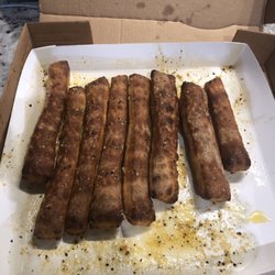 Papa Johns Pizza - Overcooked breadsticks. These were cold and hard.