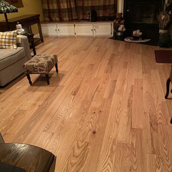 Just Carpets & Flooring - a living room with wood floors - Carpet Installation Near Me - Howell, New Jersey