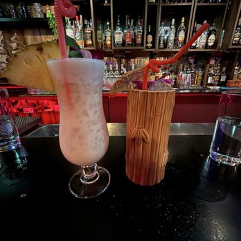 Mutiny Tiki Bar - Pina colada (left), pegleg parlay (right) - Tiki Bars Near Me - Detroit, Michigan Mutiny Tiki Bar - Pina colada (left), pegleg parlay (right) - Tiki Bars Near Me - Detroit, Michigan