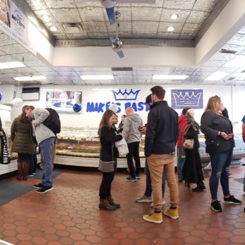 Mike's Pastry - Interior. Where an immediate crowd formed after us! The ladies were quick with their service I have to say. ALSO CASH ONLY! - Bakeries Near Me - Boston, Massachusetts
