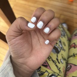 These are my nails currently and I just got my nails done two days ago. Also the jewels aren't even close together as I asked for.