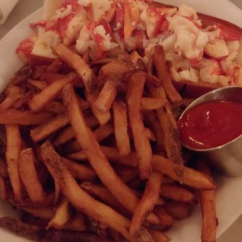 Neptune Oyster - Warm lobster roll and fries hit the spot on a chilly night - Seafood Near Me - Boston, Massachusetts Neptune Oyster - Warm lobster roll and fries hit the spot on a chilly night - Seafood Near Me - Boston, Massachusetts