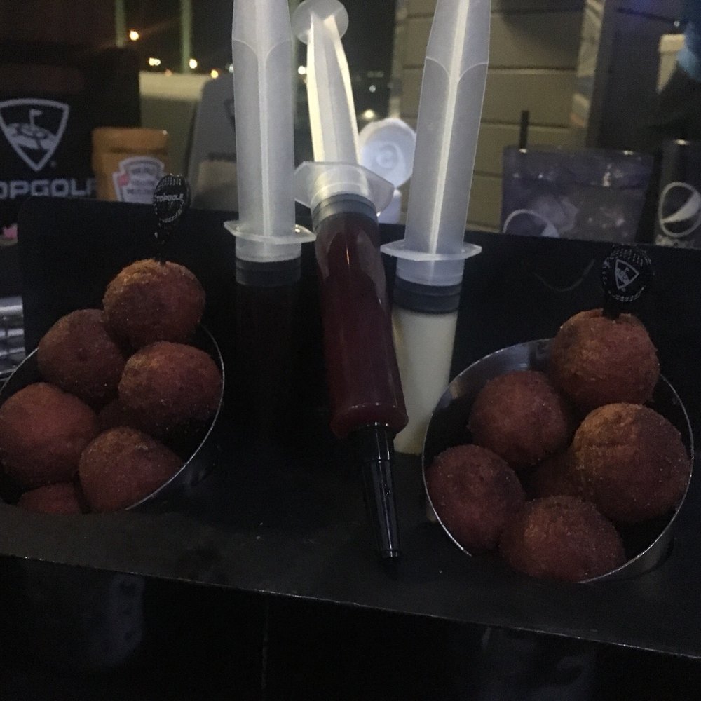Topgolf - Donut hole injection dessert. Honestly one of the main reasons to come. - Sports Bars Near Me - Midvale, Utah Topgolf - Donut hole injection dessert. Honestly one of the main reasons to come. - Sports Bars Near Me - Midvale, Utah