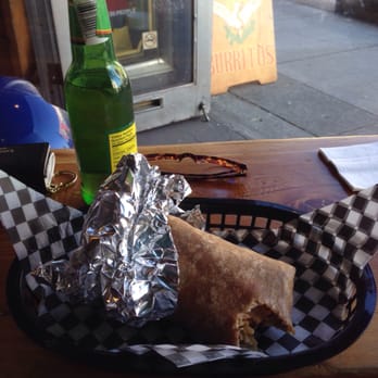 Budgies Burritos - 10 inch poser and ginger beer. Not bad. Try the green salsa. Just a little. It's super spicy! - Vegetarian Near Me - Vancouver, British Columbia
