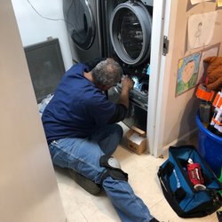 The Appliance Doctor - Chris and Mike working on machine!!