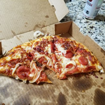 Tivoli’s Pizza - two slices of pizza - Pizza Near Me - Richmond, Michigan Tivoli’s Pizza - two slices of pizza - Pizza Near Me - Richmond, Michigan