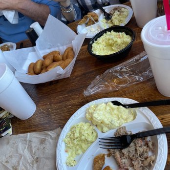 Moore's Olde Tyme BBQ - a table full of food - Barbeque Near Me - Swansboro, North Carolina