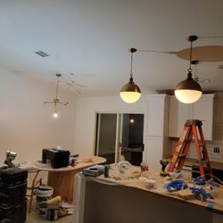 Quick Fixin' Fellas - Ceiling lighting fixtures installed.