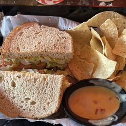 Pastrami on Rye with sweet mustard and a side of Chips and Queso. Pastrami on Rye with sweet mustard and a side of Chips and Queso.