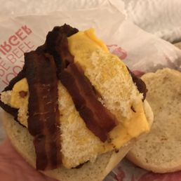 Here is my scabby burger with BURNT BACON. A starving dog wouldn't eat this garbage!! Here is my scabby burger with BURNT BACON. A starving dog wouldn't eat this garbage!!