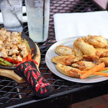 Sauced - two plates of food on a table - Pizza Near Me - Waynesville, North Carolina Sauced - two plates of food on a table - Pizza Near Me - Waynesville, North Carolina