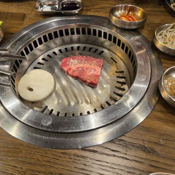 Thirsty Cow Korean BBQ - Grilling meat and onion - Steakhouses Near Me - Garden Grove, California Thirsty Cow Korean BBQ - Grilling meat and onion - Steakhouses Near Me - Garden Grove, California