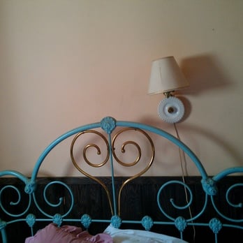 Glen Isle Resort - Headboard in Master Bedroom- Rainbow's End - Hotels Near Me - Bailey, Colorado