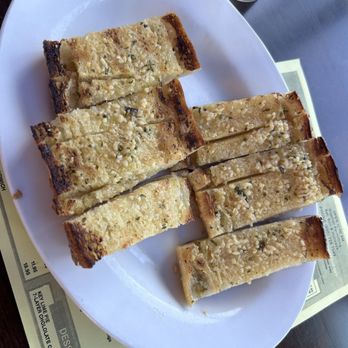 Barbara's Fishtrap - Garlic bread: crusty crispy sourdough with Parmesan dust. 4 stars - Seafood Near Me - Half Moon Bay, California Barbara's Fishtrap - Garlic bread: crusty crispy sourdough with Parmesan dust. 4 stars - Seafood Near Me - Half Moon Bay, California