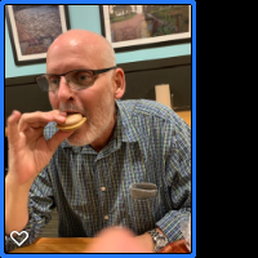 Mark enjoying his Snickers macaroon.