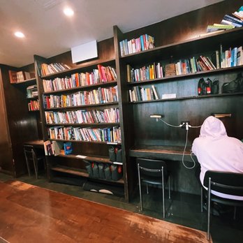 Birch Coffee - Books on shelves in rear of shop - Coffee & Tea Near Me - New York, New York Birch Coffee - Books on shelves in rear of shop - Coffee & Tea Near Me - New York, New York