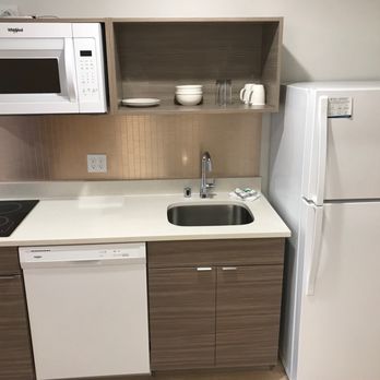 WoodSpring Suites Seattle Redmond - Kitchen's are awesome with beautiful glass cook tops and some dishes included! - Hotels Near Me - Redmond, Washington WoodSpring Suites Seattle Redmond - Kitchen's are awesome with beautiful glass cook tops and some dishes included! - Hotels Near Me - Redmond, Washington