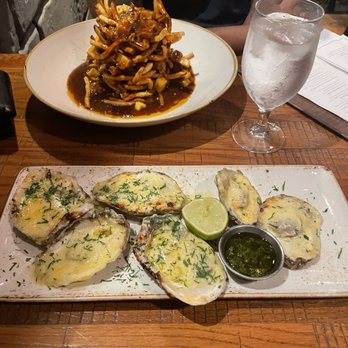 Liquid Assets - Oysters & Special: OldBay Pork Belly Poutine - American Near Me - Ocean City, Maryland Liquid Assets - Oysters & Special: OldBay Pork Belly Poutine - American Near Me - Ocean City, Maryland