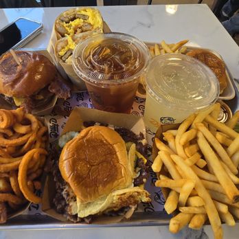 Dilly D - Western bacon cheeseburger, breakfast  burrito, kids cheeseburger, curly fries, double smash cheeseburger and regular fries. - Breakfast & Brunch Near Me - Rolling Hills Estates, California