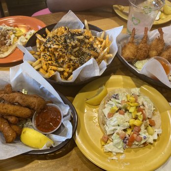 Coconut's Fish Cafe - Kamaole - Calamari, Fish Tacos (GF), volcano fries and Coconut Shrimp - Seafood Near Me - Kihei, Hawaii Coconut's Fish Cafe - Kamaole - Calamari, Fish Tacos (GF), volcano fries and Coconut Shrimp - Seafood Near Me - Kihei, Hawaii