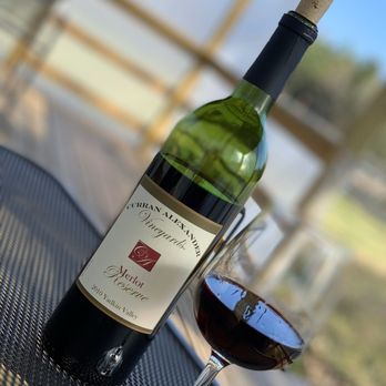 Curran Alexander Vineyards - a bottle of wine and a glass of wine - Wine Tasting Room Near Me - Lexington, North Carolina Curran Alexander Vineyards - a bottle of wine and a glass of wine - Wine Tasting Room Near Me - Lexington, North Carolina