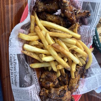 Alphonso's Seafood - Hand tossed wings  Naked. They also do breaded - Seafood Near Me - Belle Chasse, Louisiana