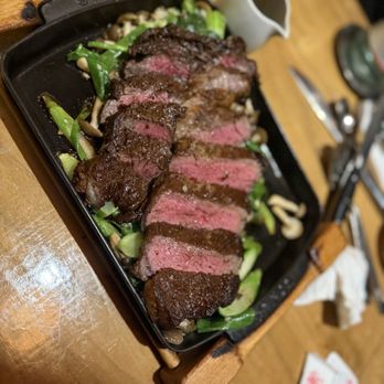 Morimoto Asia Waikiki - Ribeye Steak on a bed of veggies (16oz) - Asian Fusion Near Me - Honolulu, Hawaii Morimoto Asia Waikiki - Ribeye Steak on a bed of veggies (16oz) - Asian Fusion Near Me - Honolulu, Hawaii