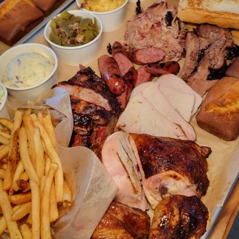 City Barbeque - Platter of meats, with cornbread, garlic bread, and sides - Barbeque Near Me - Winter Park, Florida