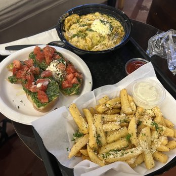 Wanderlust Wine Company - Downtown - Delicious pasta, bruschetta and truffle fries from the food truck - Wine Bars Near Me - Austin, Texas Wanderlust Wine Company - Downtown - Delicious pasta, bruschetta and truffle fries from the food truck - Wine Bars Near Me - Austin, Texas
