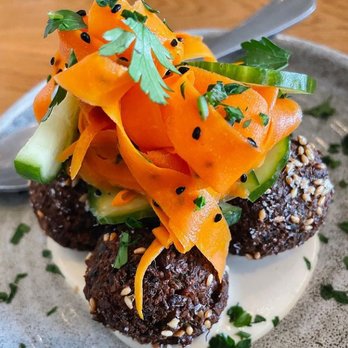 Zhug - Falafel with tahini, carrots, cucumber, and sesame seeds - Mediterranean Near Me - Cleveland Heights, Ohio