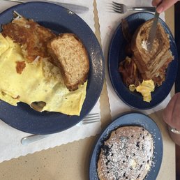 Vegetable omelette, cream cheese and blueberry pancake, breakfast plate Vegetable omelette, cream cheese and blueberry pancake, breakfast plate