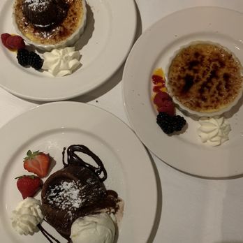 One Bistro - three plates of desserts on a table - American Near Me - Norwood, Massachusetts One Bistro - three plates of desserts on a table - American Near Me - Norwood, Massachusetts