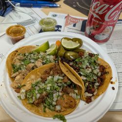 Pastor, poyo, and chorizo tacos. Yum.