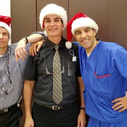 Stephen Mocrae Dentistry - Dr. Wohl, Dr. Mocrae, and Dr. Gino putting on a smile for Christmas.