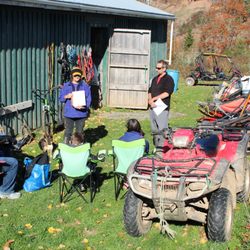 Skywolf K9 Adventures - Tour group learning about the history of mushing with Deb and Jonathan