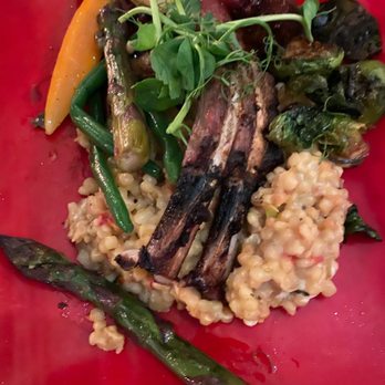 Cielo Restaurant - Lamb chops with couscous, green beans, carrots and Brussels sprouts. - New American Near Me - Sanibel, Florida Cielo Restaurant - Lamb chops with couscous, green beans, carrots and Brussels sprouts. - New American Near Me - Sanibel, Florida