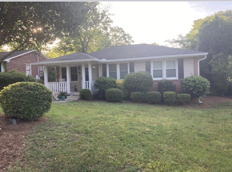 Slide of Gutter Guys Construction