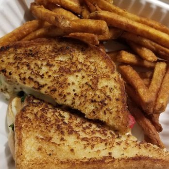 Newport Creamery - Spinach pie grilled cheese & seasoned fries - American Near Me - Barrington, Rhode Island