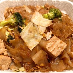 Eat Thai Cuisine - Pad See Ew with tofu. Cabbage, Chinese broccoli, and carrots with flat rice noodles. Love. I recommend trying it here.