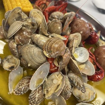 Yummy Crab - Spokane - a plate of clams and corn - Seafood Near Me - Spokane, Washington Yummy Crab - Spokane - a plate of clams and corn - Seafood Near Me - Spokane, Washington