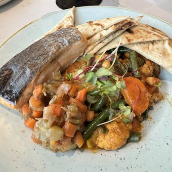 Table Rock House Restaurant - Veggie curry with salmon - American Near Me - Niagara Falls, Ontario Table Rock House Restaurant - Veggie curry with salmon - American Near Me - Niagara Falls, Ontario
