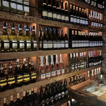 Aria Hell's Kitchen - Wall of wine that blocks off the restroom - Italian Near Me - New York, New York Aria Hell's Kitchen - Wall of wine that blocks off the restroom - Italian Near Me - New York, New York