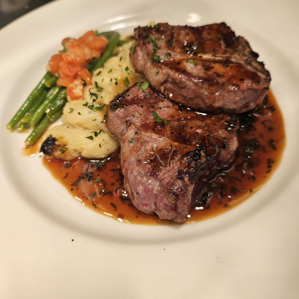 Lamb loin chop, cooked medium. Served with Mash potato and green bean. Lamb loin chop, cooked medium. Served with Mash potato and green bean.