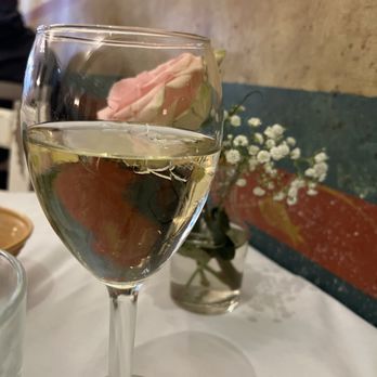 Taverna Cretekou - A glass of house wine before dinner - Greek Near Me - Alexandria, Virginia Taverna Cretekou - A glass of house wine before dinner - Greek Near Me - Alexandria, Virginia