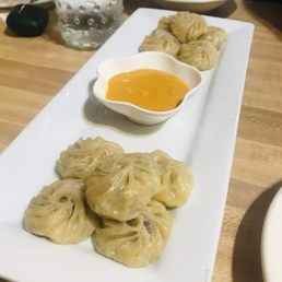 Vegetable Momo ($8.99) -- Minced Vegetables marinated in spices, stuffed in flour wrap and steamed. Served with Momo Sauce.