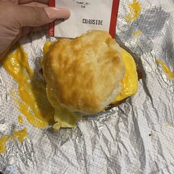 Chick-fil-A - ows a hand holding a biscuit - Fast Food Near Me - Houston, Texas Chick-fil-A - ows a hand holding a biscuit - Fast Food Near Me - Houston, Texas