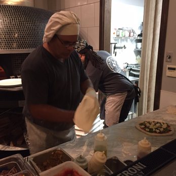 Brick Fire Tavern - Delicious pizza being made - Pizza Near Me - Honolulu, Hawaii