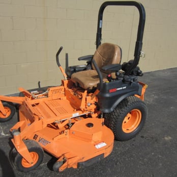 Charlie's Lawncare - orange riding mower - Landscaping Near Me Charlie's Lawncare - orange riding mower - Landscaping Near Me